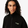 Sudadera con cremallera y insignia de corte holgado