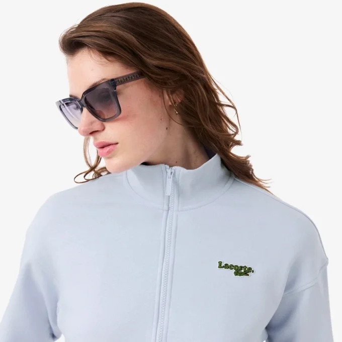 Sudadera con cremallera y insignia de corte holgado