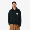 Sudadera con cuello alto, cremallera y detalle de insignia de la pasarela