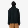 Sudadera con cuello alto, cremallera y detalle de insignia de la pasarela