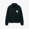 Sudadera con cuello alto, cremallera y detalle de insignia de la pasarela