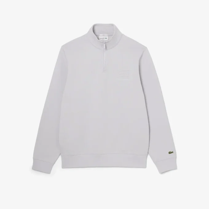 Sudadera con cuello alto y cremallera en relieve