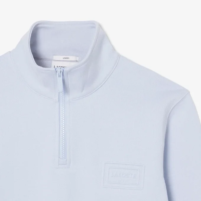 Sudadera con cuello alto y cremallera en relieve