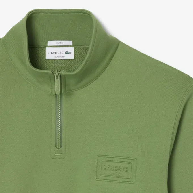 Sudadera con cuello alto y cremallera en relieve