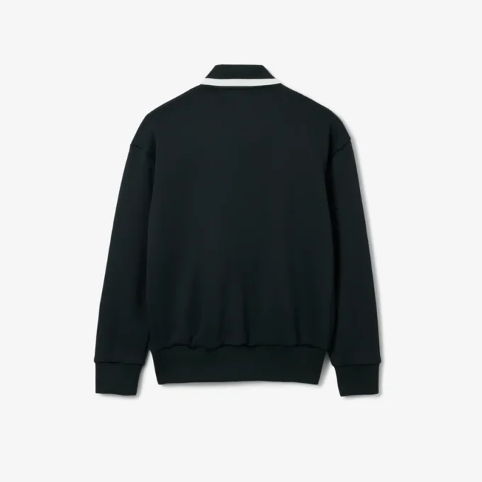 Sudadera con detalle de insignia en el cuello de polo de la pasarela