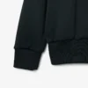 Sudadera con detalle de insignia en el cuello de polo de la pasarela