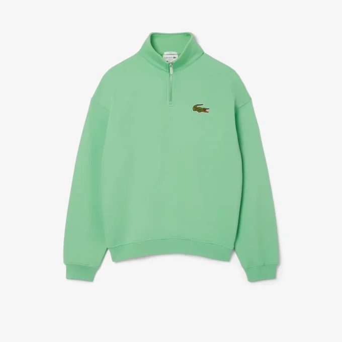 Sudadera unisex de corte holgado con detalle de insignia y media cremallera