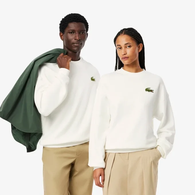 Sudadera unisex de felpa de corte holgado con detalle de insignia