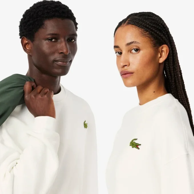 Sudadera unisex de felpa de corte holgado con detalle de insignia