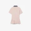 Vestido polo de piqué con falda plisada