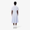 Vestido polo mini acampanado de mujer
