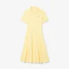 Vestido polo mini acampanado de mujer