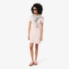 Vestido polo mini de piqué elástico de corte ajustado para mujer