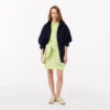 Vestido polo mini de piqué elástico de corte ajustado para mujer