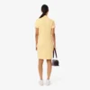 Vestido polo mini de piqué elástico de corte ajustado para mujer