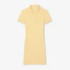 Vestido polo mini de piqué elástico de corte ajustado para mujer