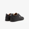 Zapatillas Bayliss de piel con cuello perforado para hombre